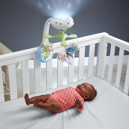 Bébé observe mobile musical avec projection lumineuse étoiles au plafond