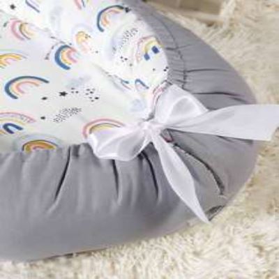 Reducteur de Lit Arc En Ciel Sa conception ergonomique et ses matériaux respirants garantissent sommeil paisible et sécurisé