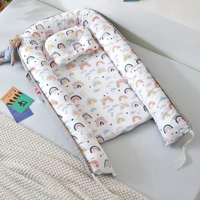 Reducteur de Lit Arc En Ciel offre environnement douillet et rassurant