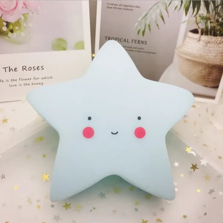veilleuse bébé étoile blue sur table